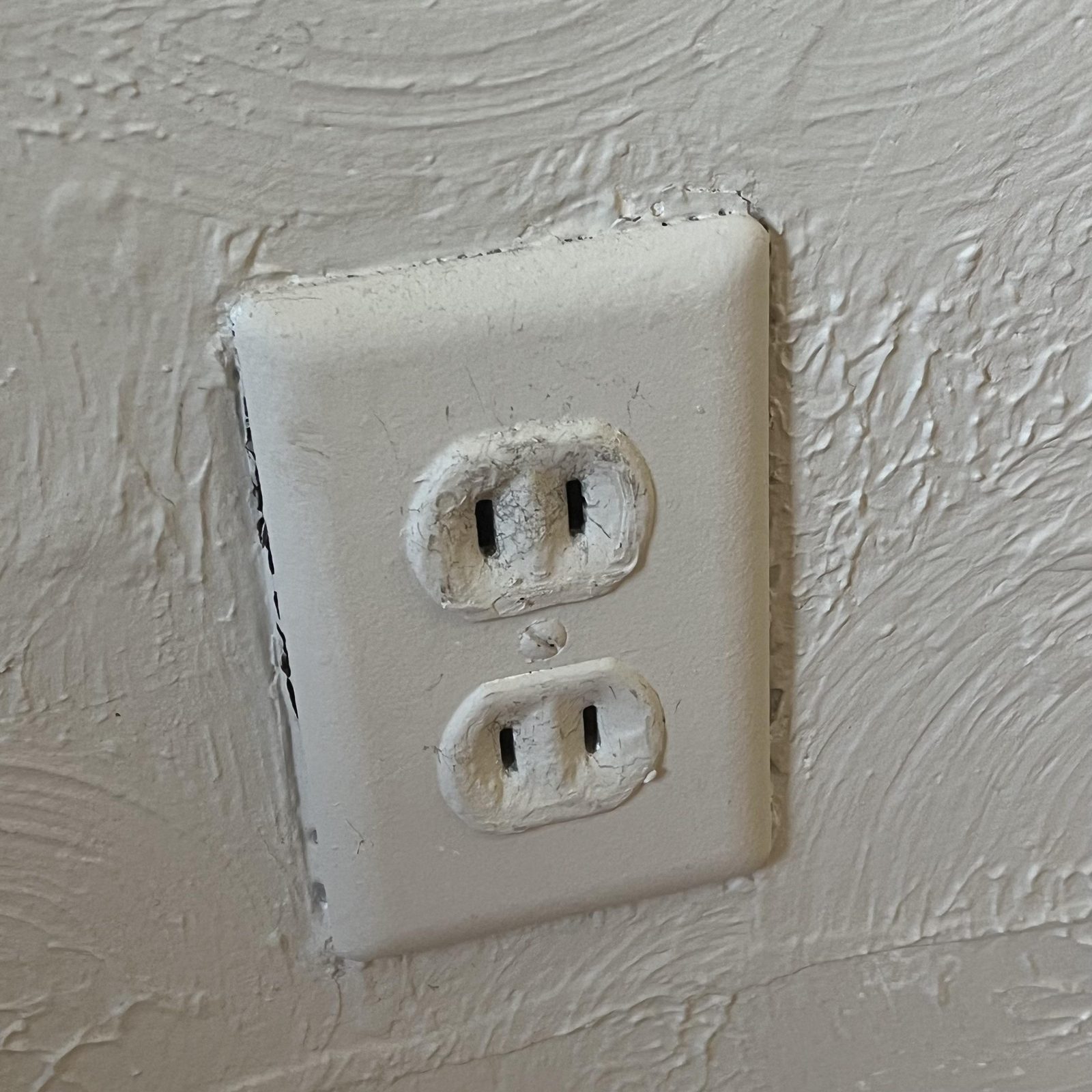 Old ungrounded two-prong outlet
